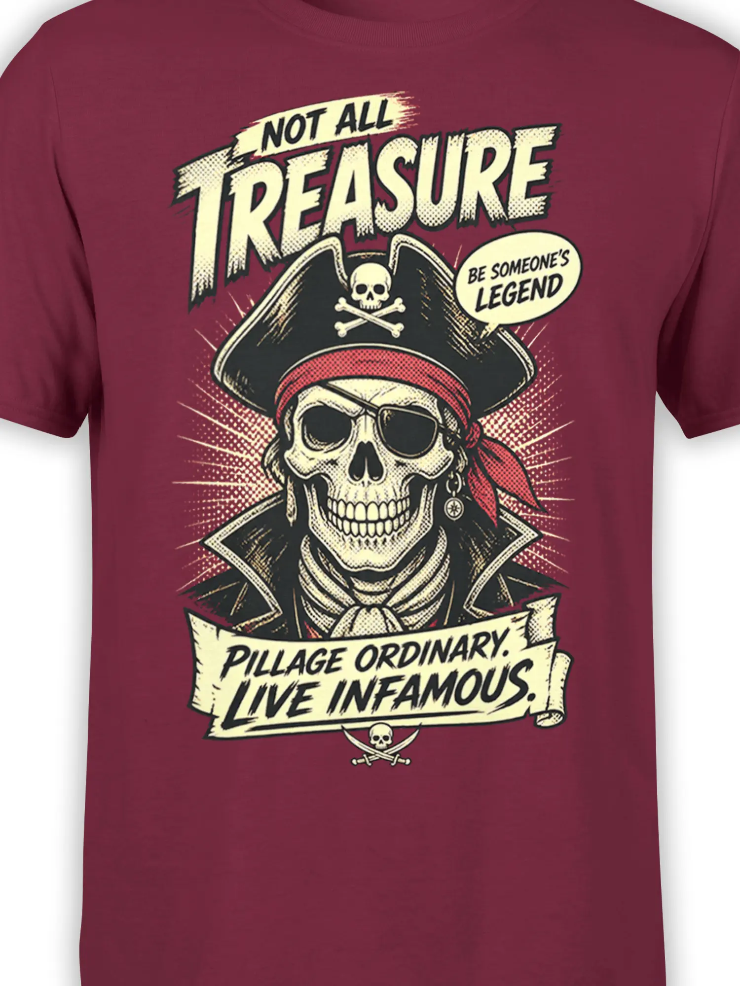 Close-up of pirate skull captain artwork and bold vintage lettering on a burgundy graphic T-shirt