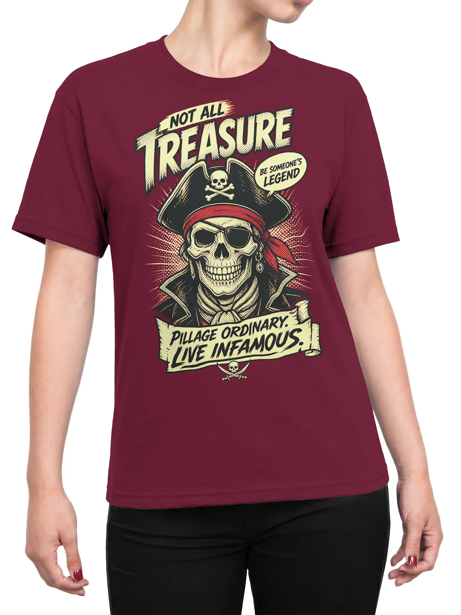 Female torso wearing a burgundy pirate skull T-shirt with vintage comic artwork and rebellious lettering