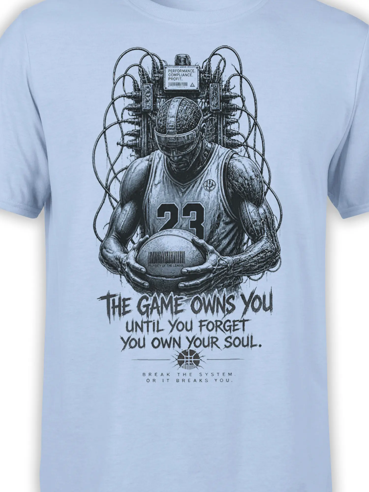 Close-up of wired basketball player artwork, number 23 jersey, machine details, and bold text on a light blue tee
