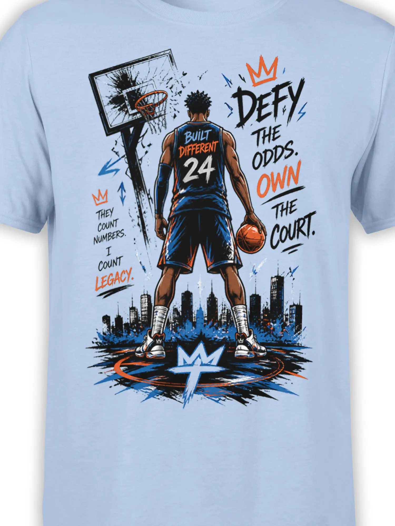 Close-up of light blue basketball graphic tee showing the player, number 24, crown details, and legacy text