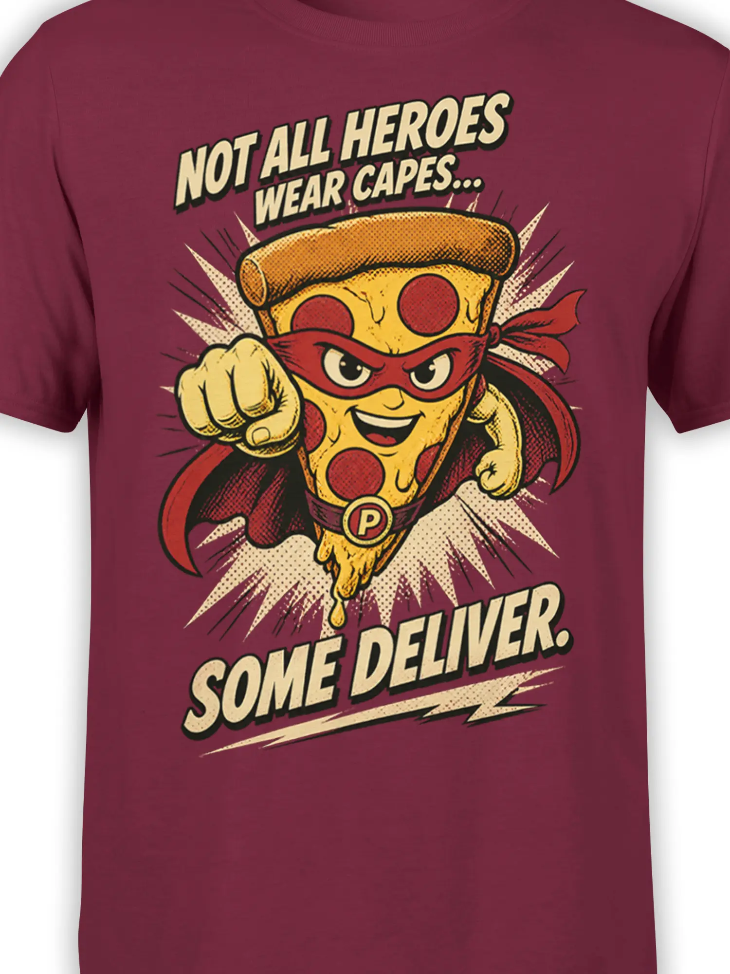 Close-up of the masked pizza hero graphic, red cape, bold lettering, and halftone comic details on burgundy fabric
