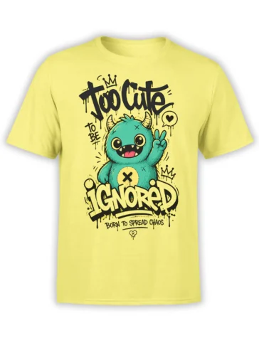 Yellow T-shirt with a teal horned monster, bold graffiti lettering, and a Too Cute to Be Ignored design