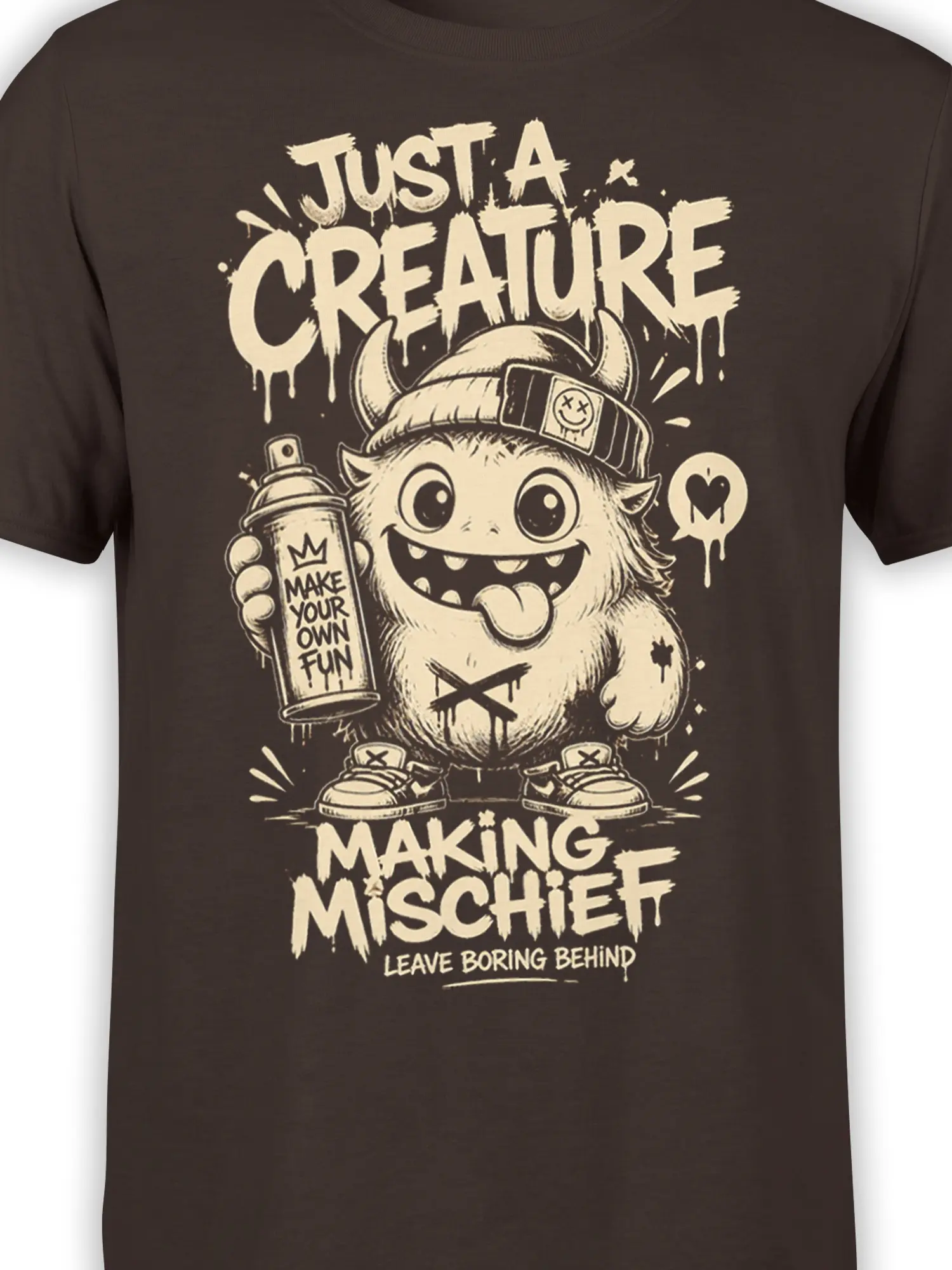Close-up of horned creature and spray can on brown monster graphic T-shirt