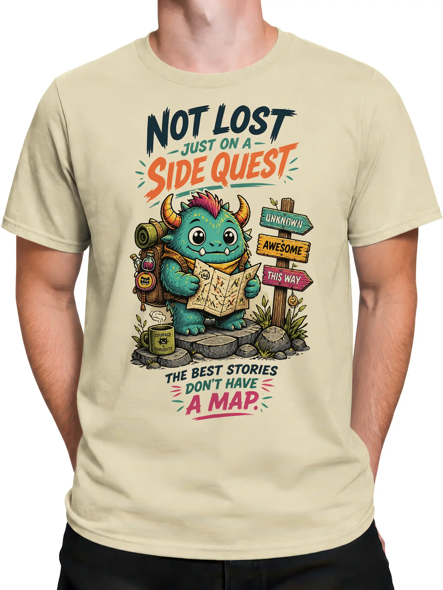 Male torso wearing a beige side quest T-shirt with a colorful horned fantasy creature design