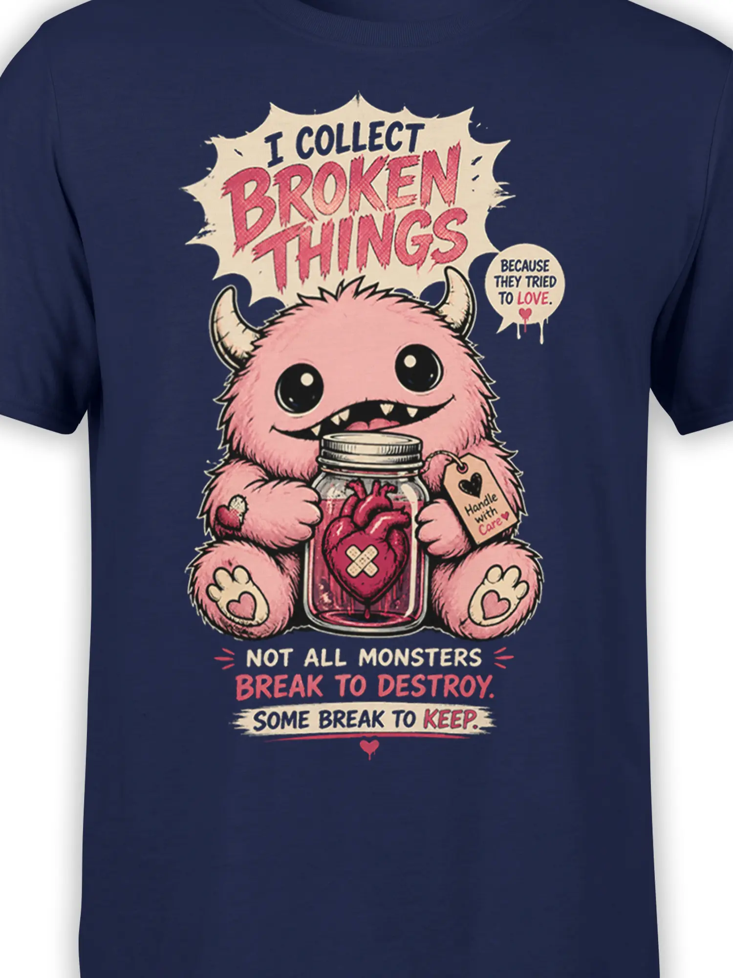 Close-up of pink monster, broken heart jar, and vintage lettering on navy fabric