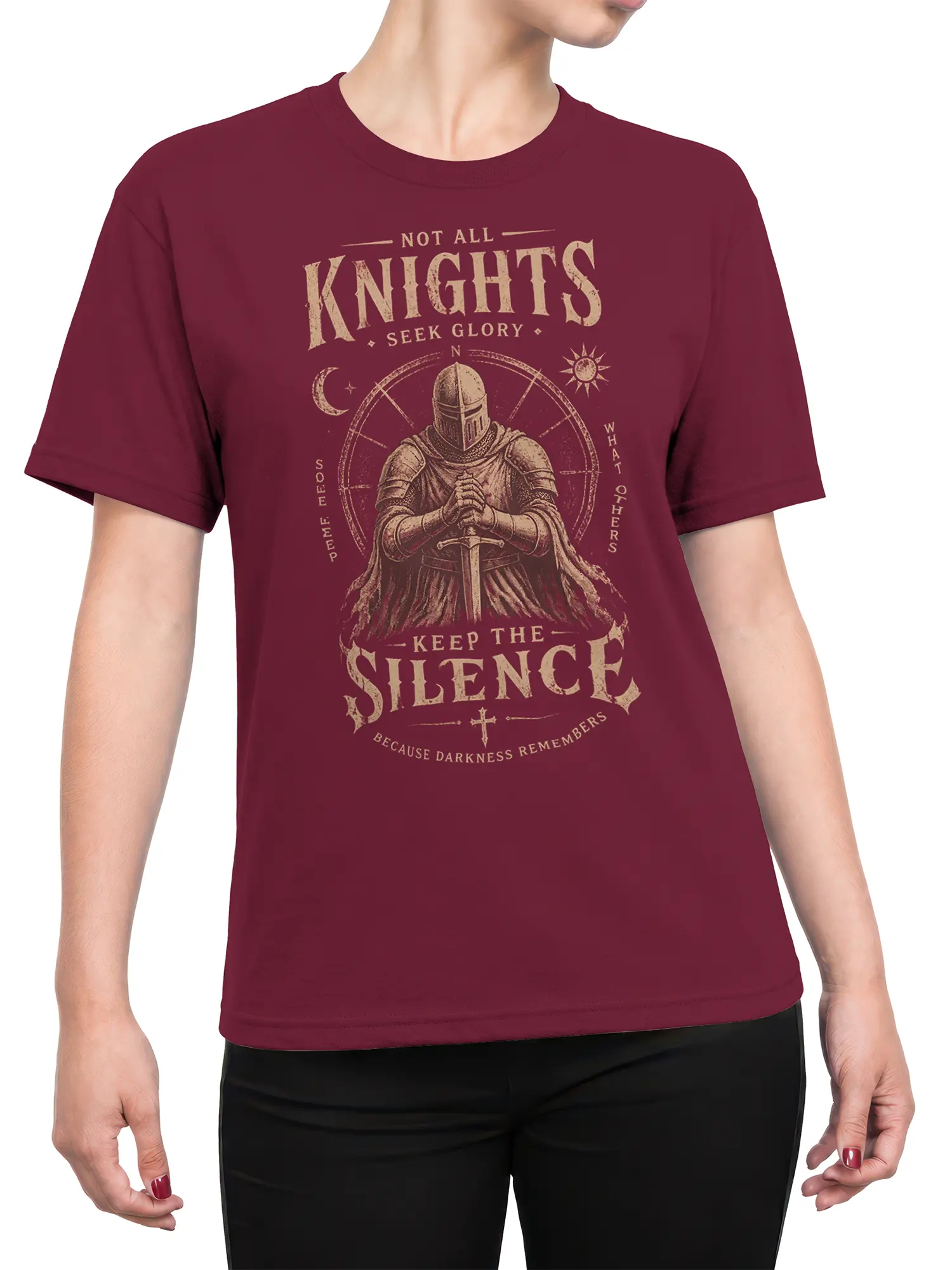 Female torso wearing burgundy knight T-shirt with vintage armored warrior and silent oath graphic