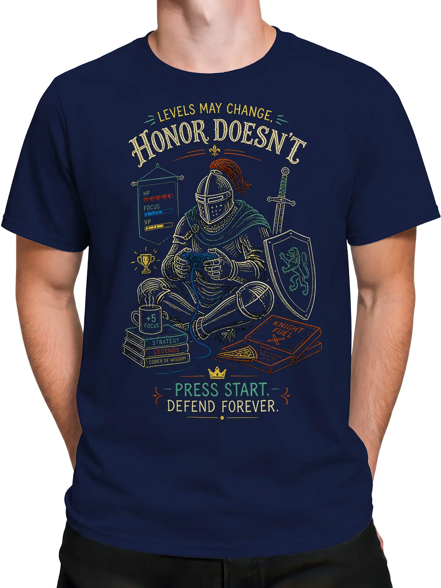 Male torso wearing a navy fantasy knight gaming T-shirt with controller, shield, sword, and colorful honor artwork