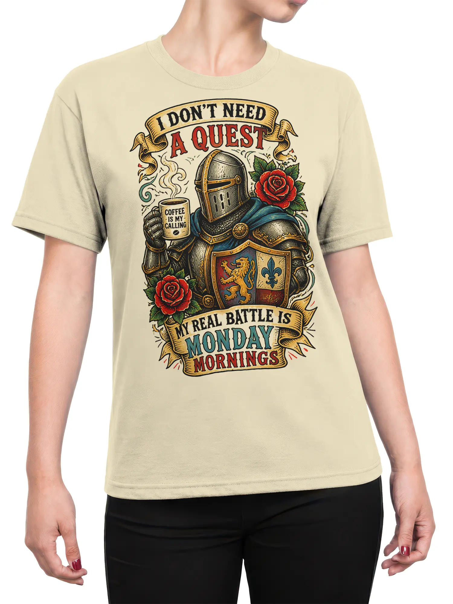 Female torso wearing beige knight coffee T-shirt with roses, shield, and Monday morning message