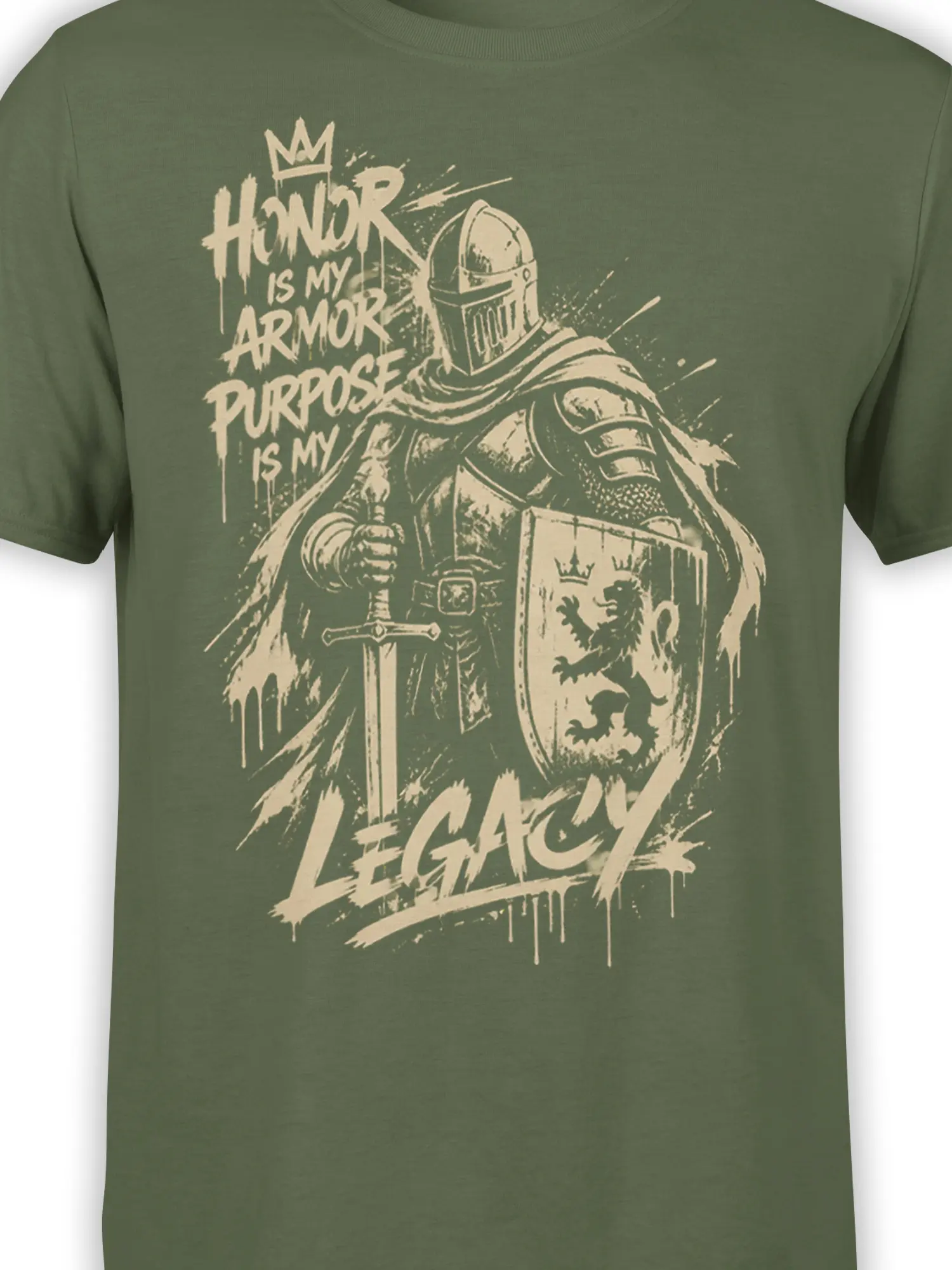 Close-up of cream medieval knight artwork, lion shield, crown, and legacy text on an olive green shirt