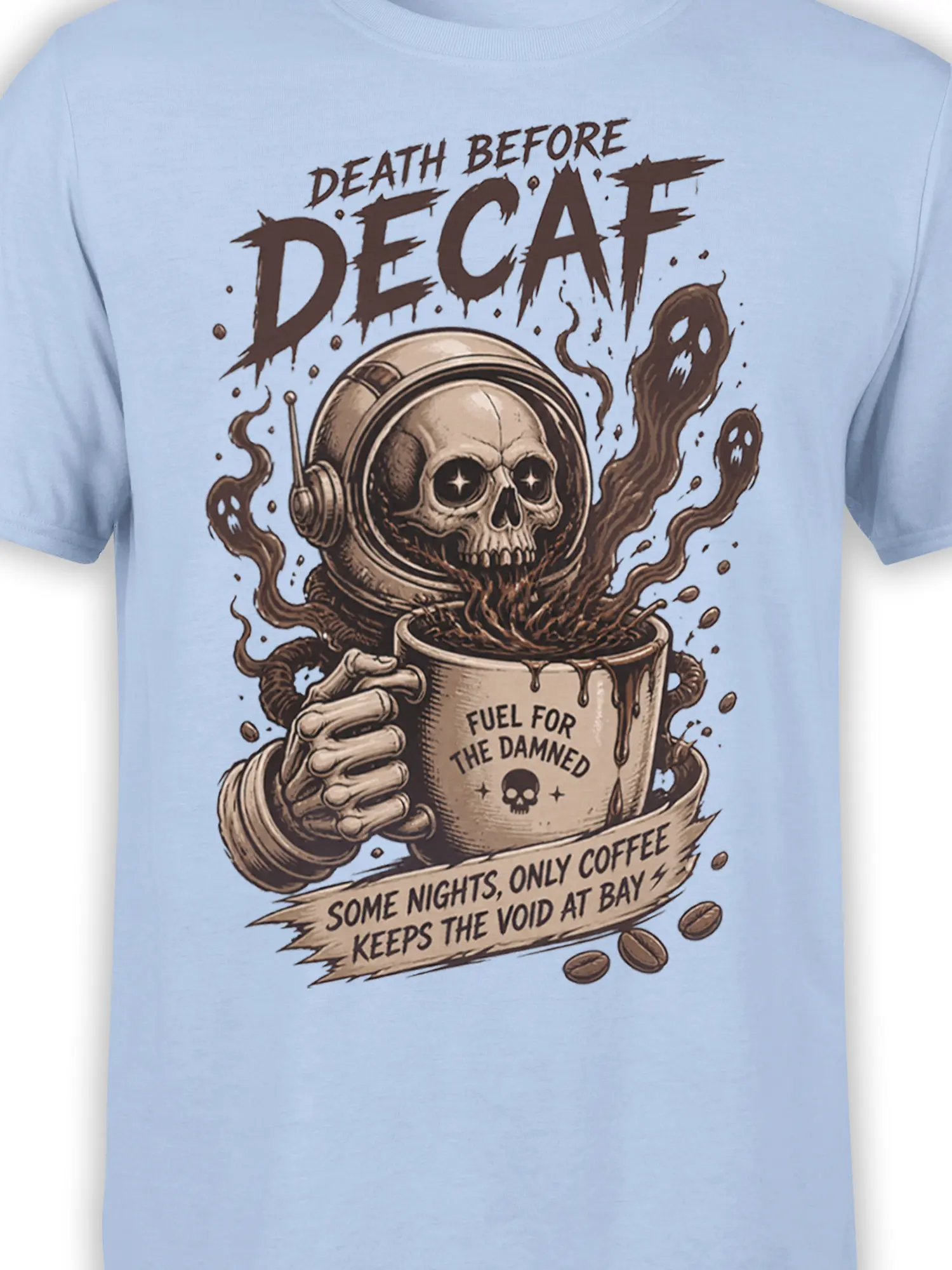 Close-up of skull coffee artwork with ghostly smoke and Death Before Decaf text on a light blue shirt