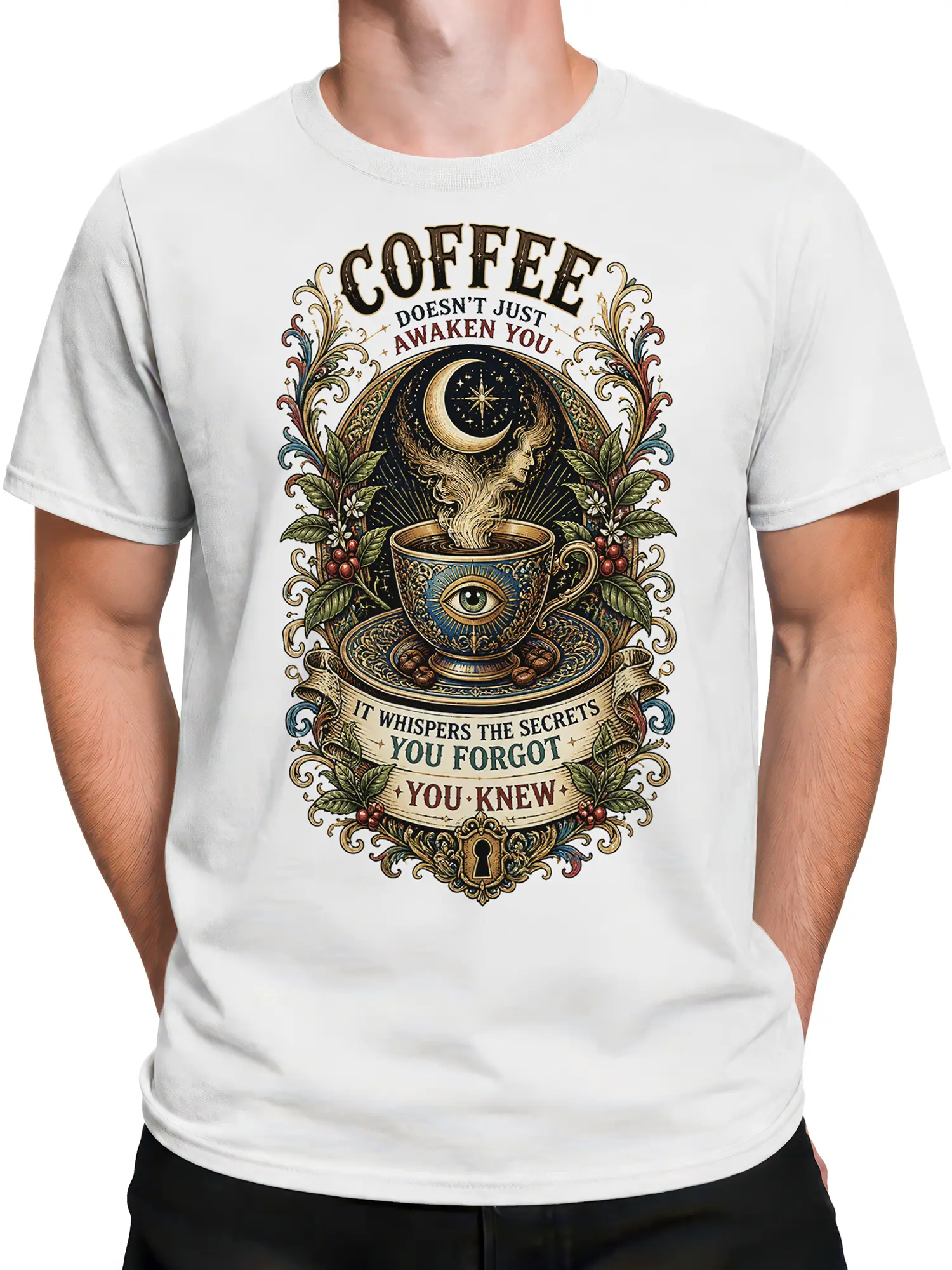 Male torso wearing a white coffee graphic T-shirt with eye cup, crescent moon, and vintage secret message