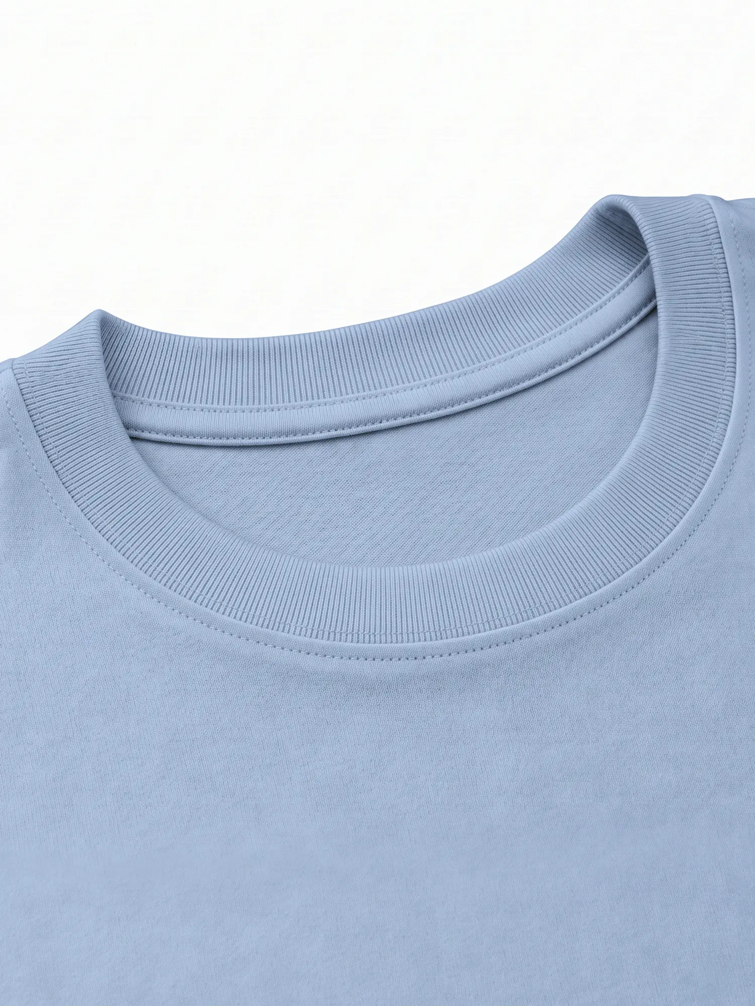 Close-up of the ribbed cotton collar on a light blue T-shirt