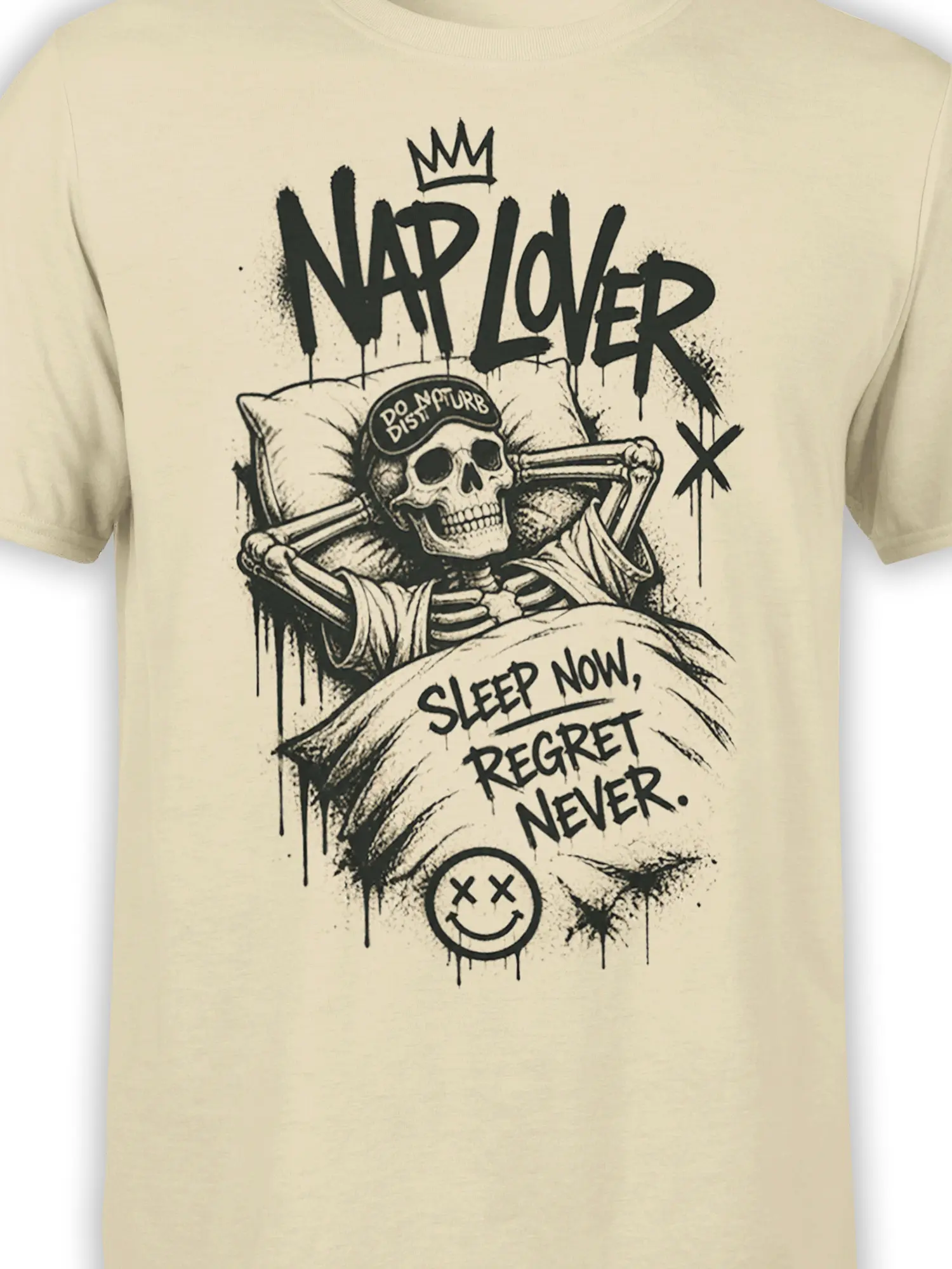Close-up of crowned skeleton in bed with sleep mask and dark sleep humor lettering on beige fabric