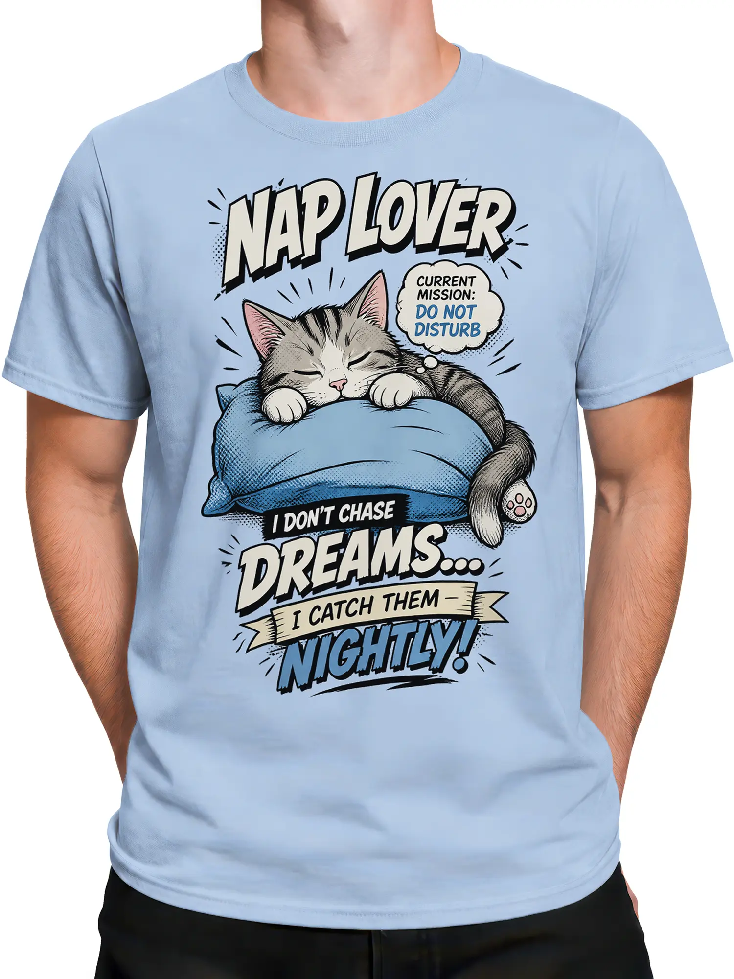 Male torso wearing a light blue sleepy cat T-shirt with bold nap lover lettering and pillow artwork