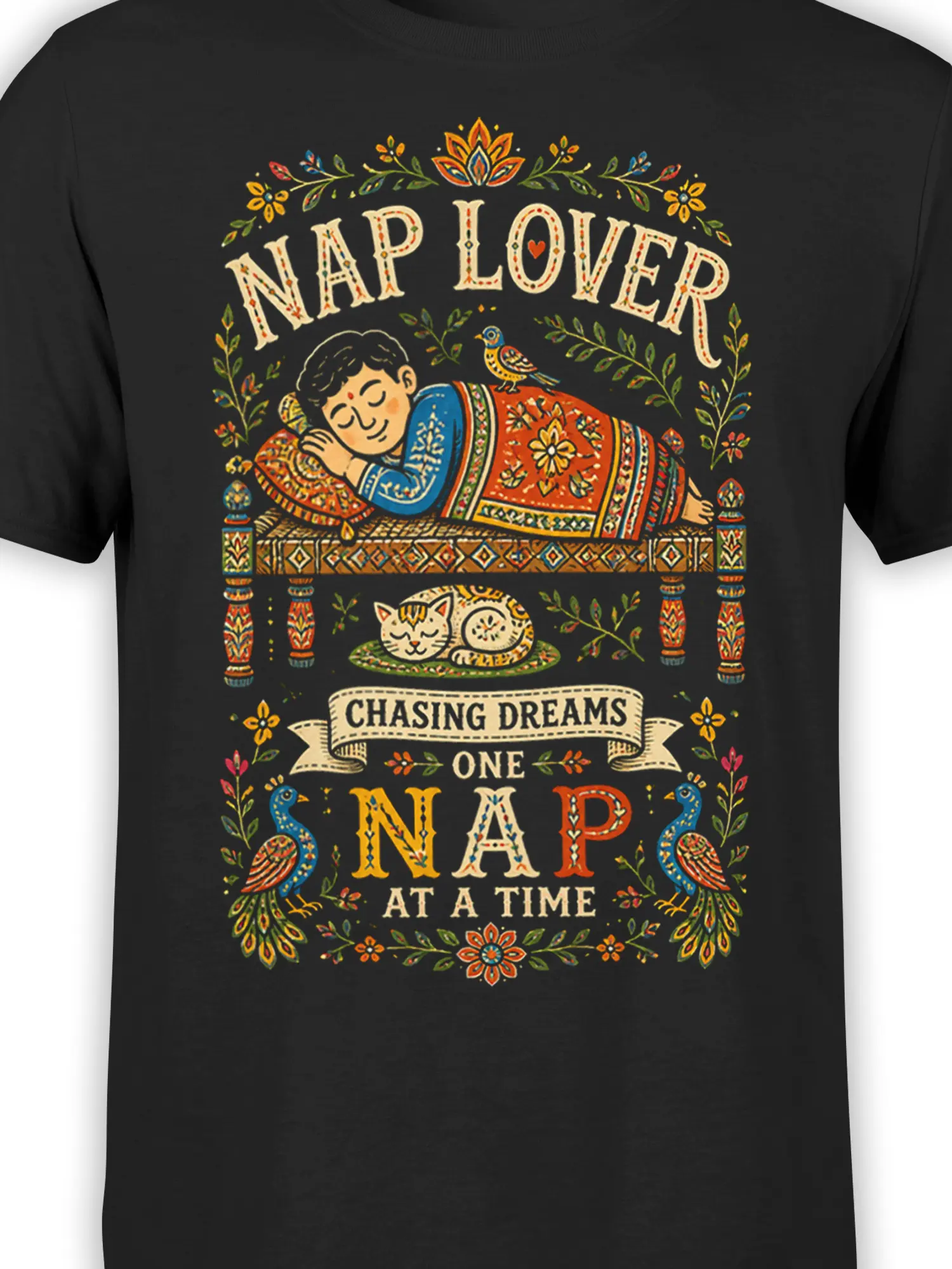 Close-up of colorful nap lover folk art design with a sleeping figure, cat, peacocks, flowers, and lettering