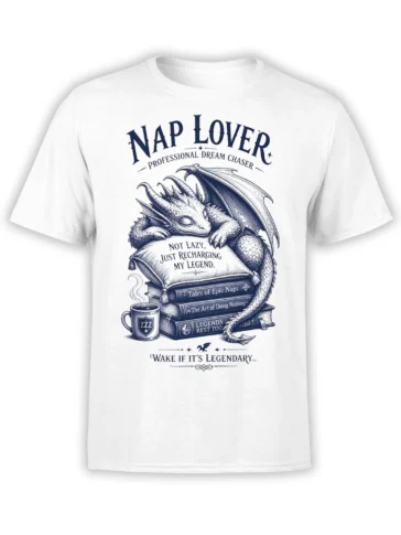 White T-shirt with a sleeping dragon, books, coffee mug, and “Nap Lover” lettering in dark blue