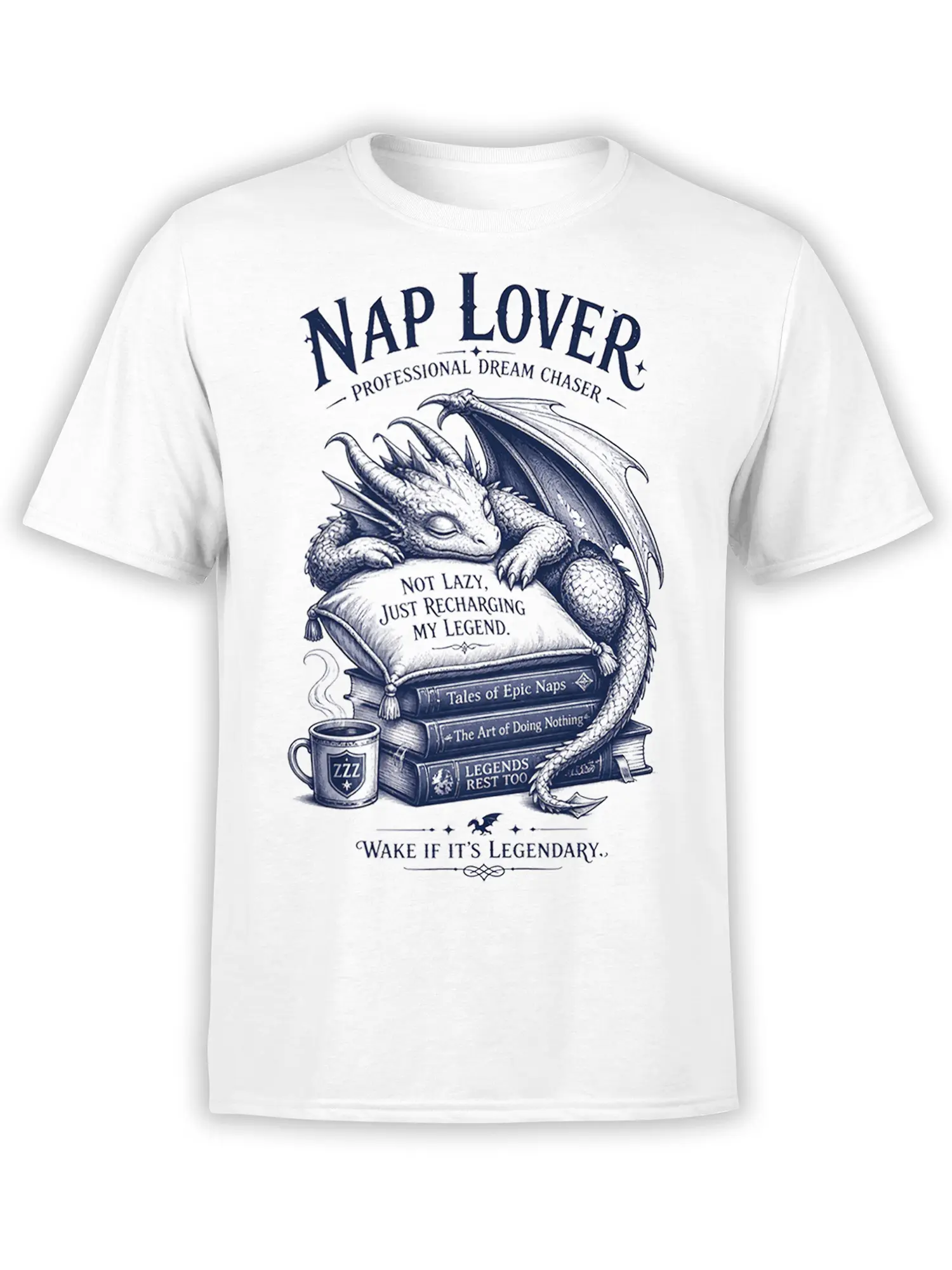 White T-shirt with a sleeping dragon, books, coffee mug, and “Nap Lover” lettering in dark blue