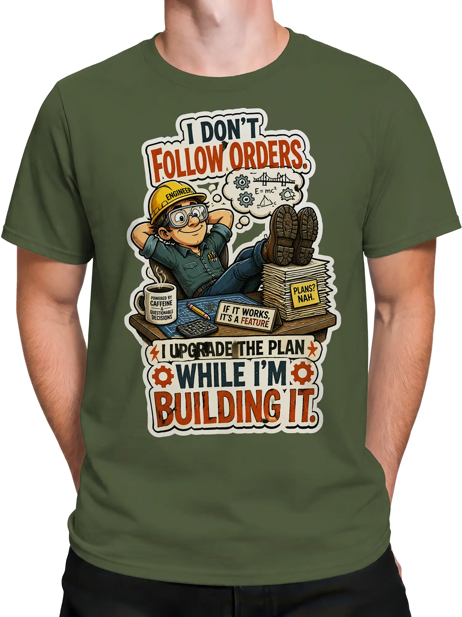 Male torso wearing green engineer T-shirt with cartoon builder, technical plans, coffee, and colorful graphic text