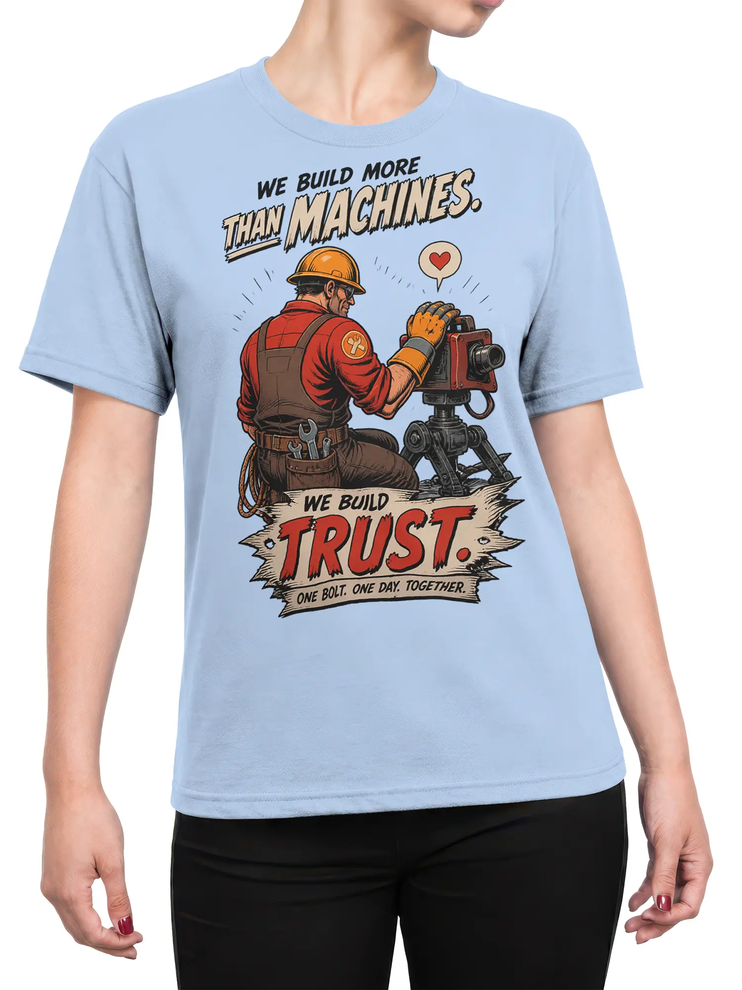 Female torso wearing a light blue construction worker T-shirt with a vintage trust and teamwork graphic