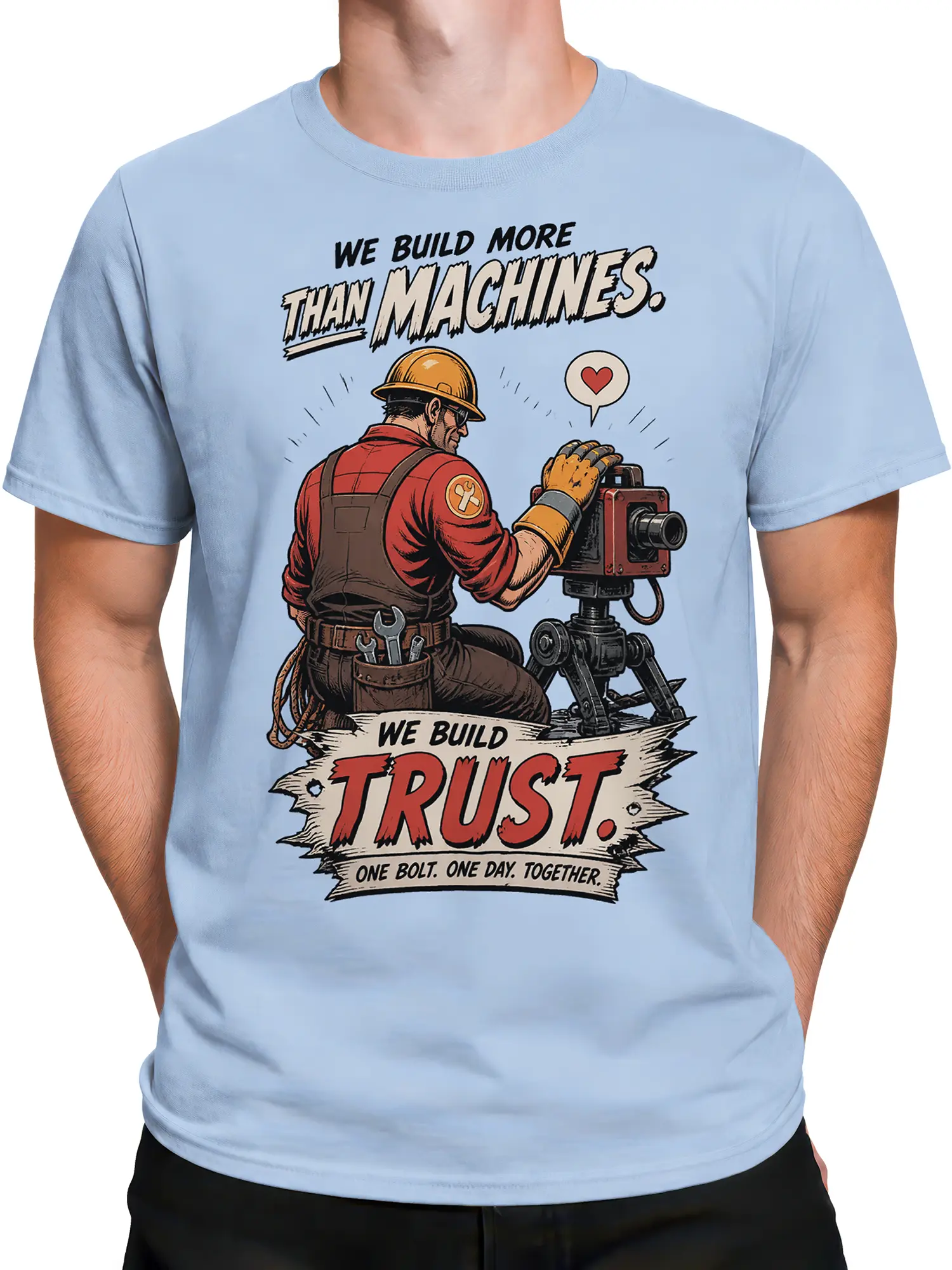 Male torso wearing a light blue builder T-shirt with a vintage construction worker and machine design