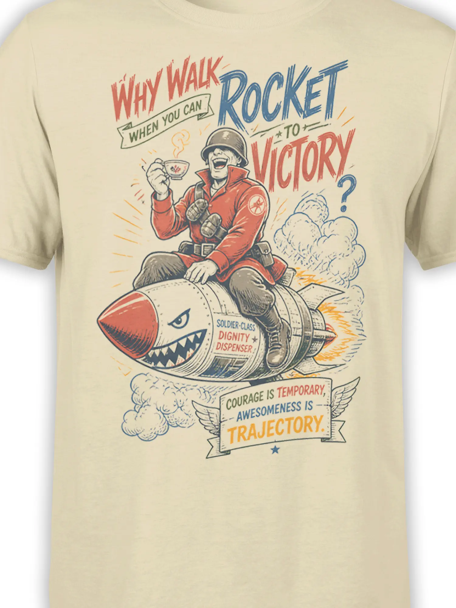Close-up of beige shirt graphic showing a smiling helmeted soldier on a rocket with clouds and motivational military lettering