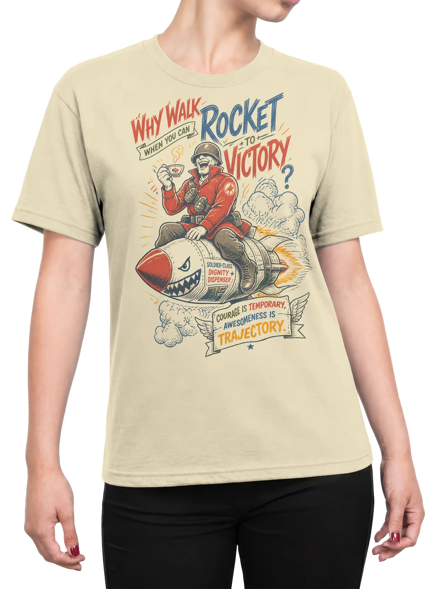 Female torso wearing a beige T-shirt with a vintage soldier rocket graphic and colorful military-style lettering