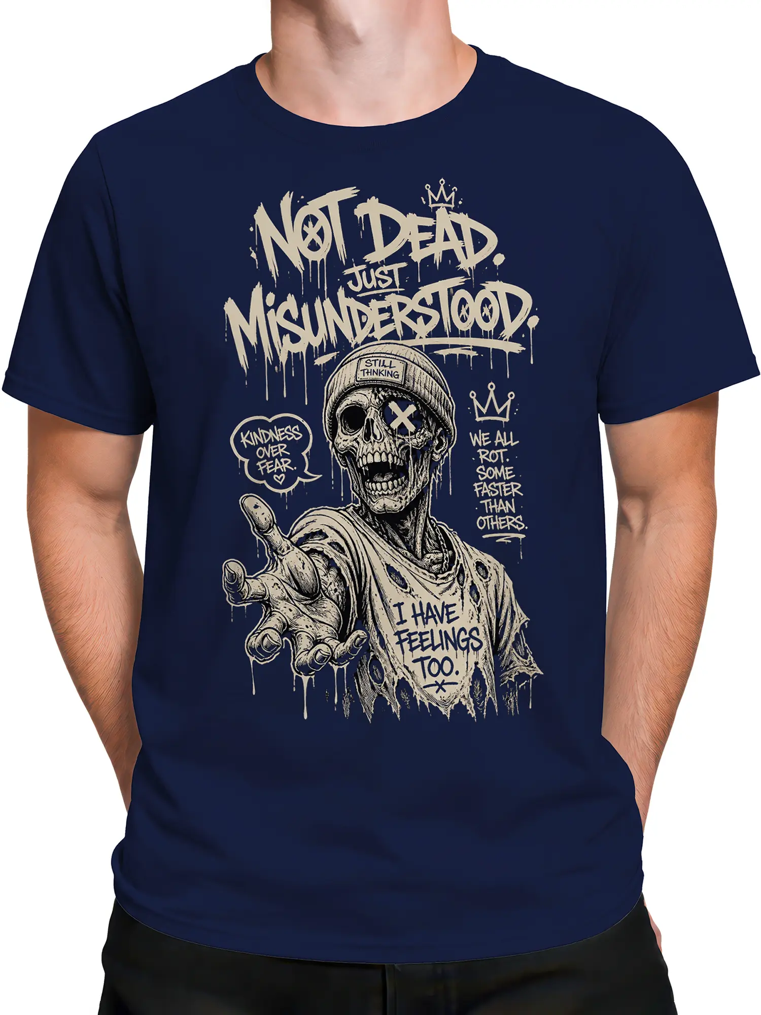 Male torso wearing a navy zombie graphic tee with crowned skull and misunderstood message