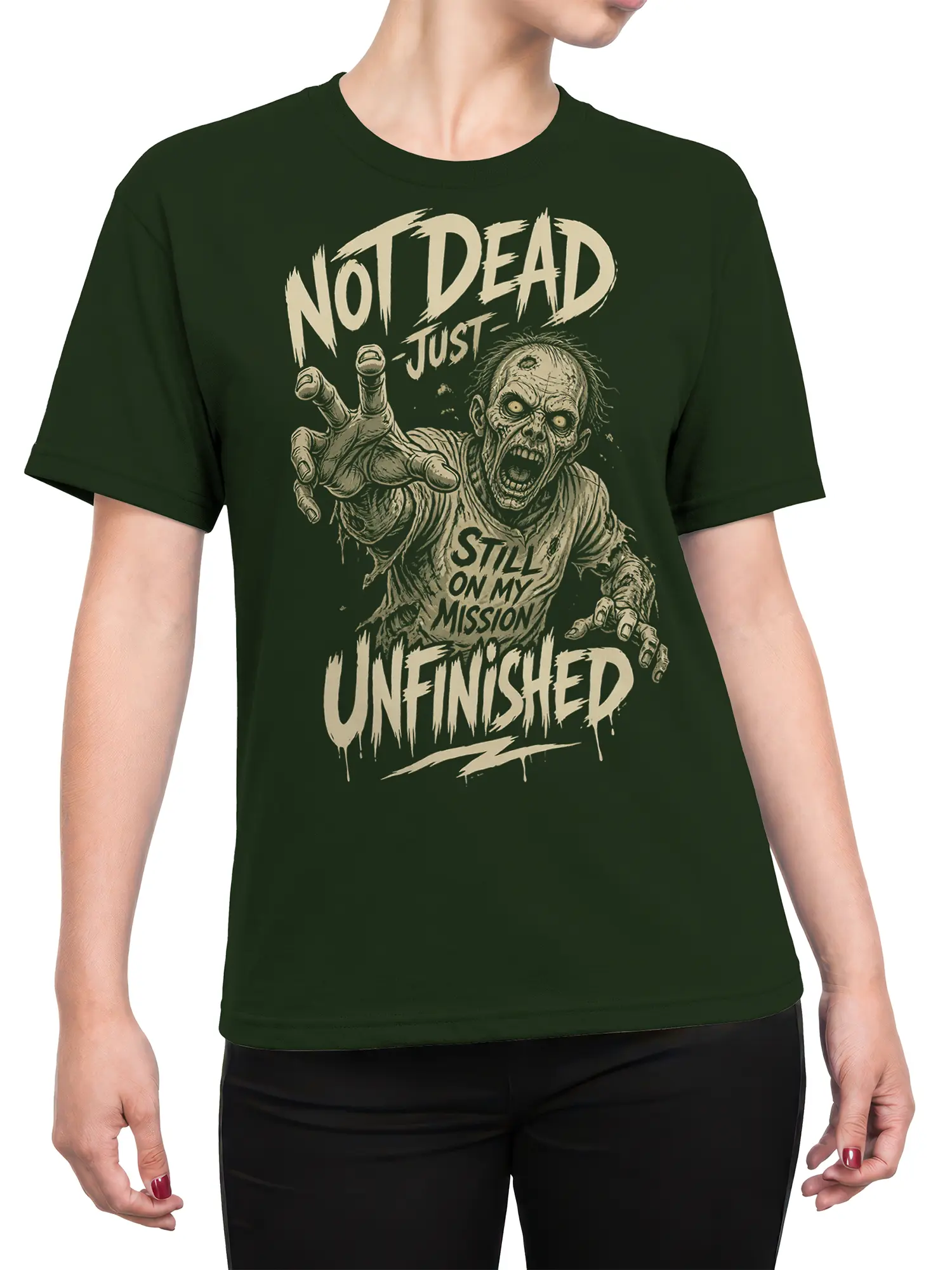 Female torso wearing a dark green zombie T-shirt with vintage horror artwork and unfinished mission lettering