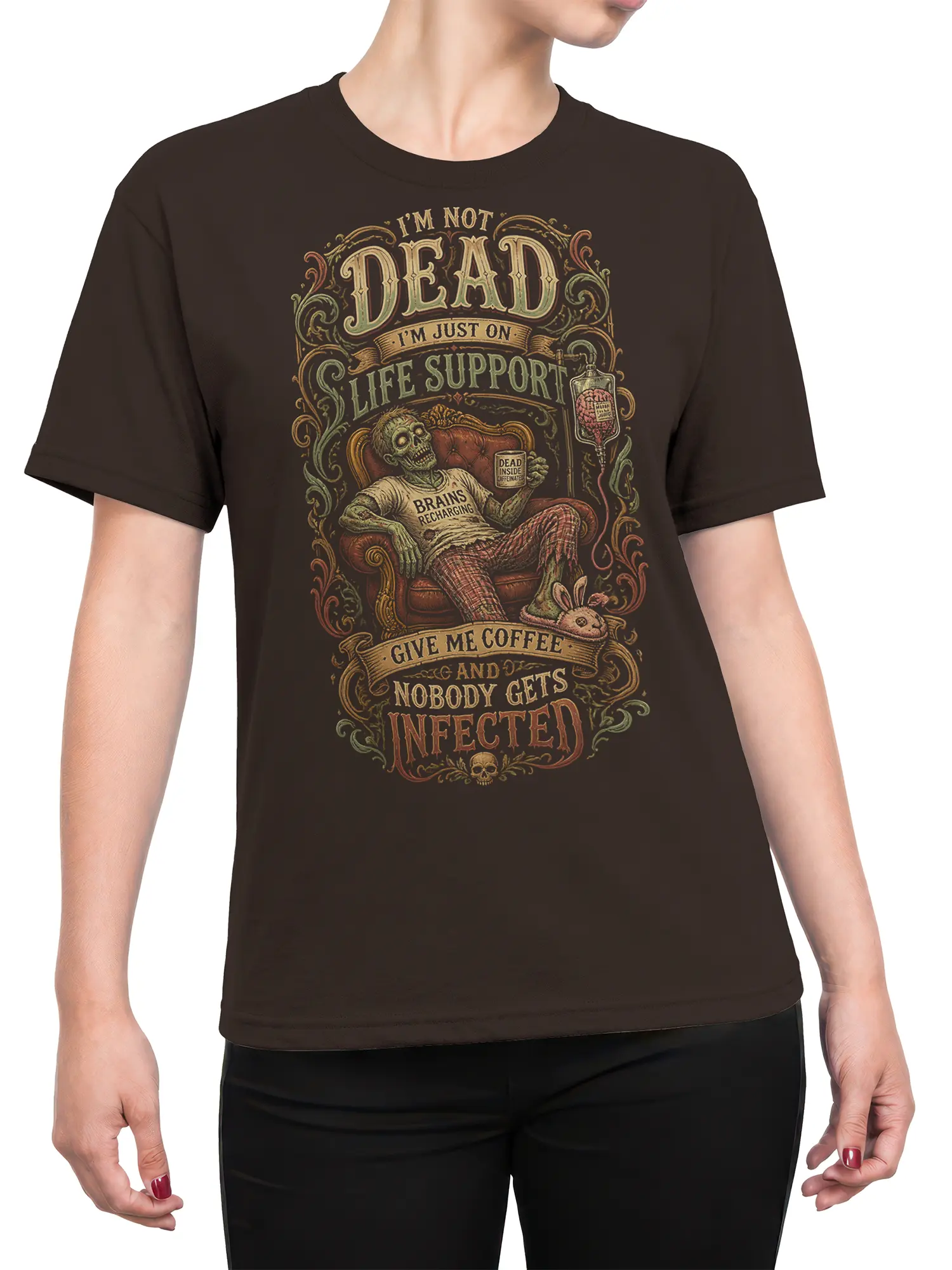 Female torso wearing a brown zombie coffee T-shirt with vintage horror artwork and humorous lettering