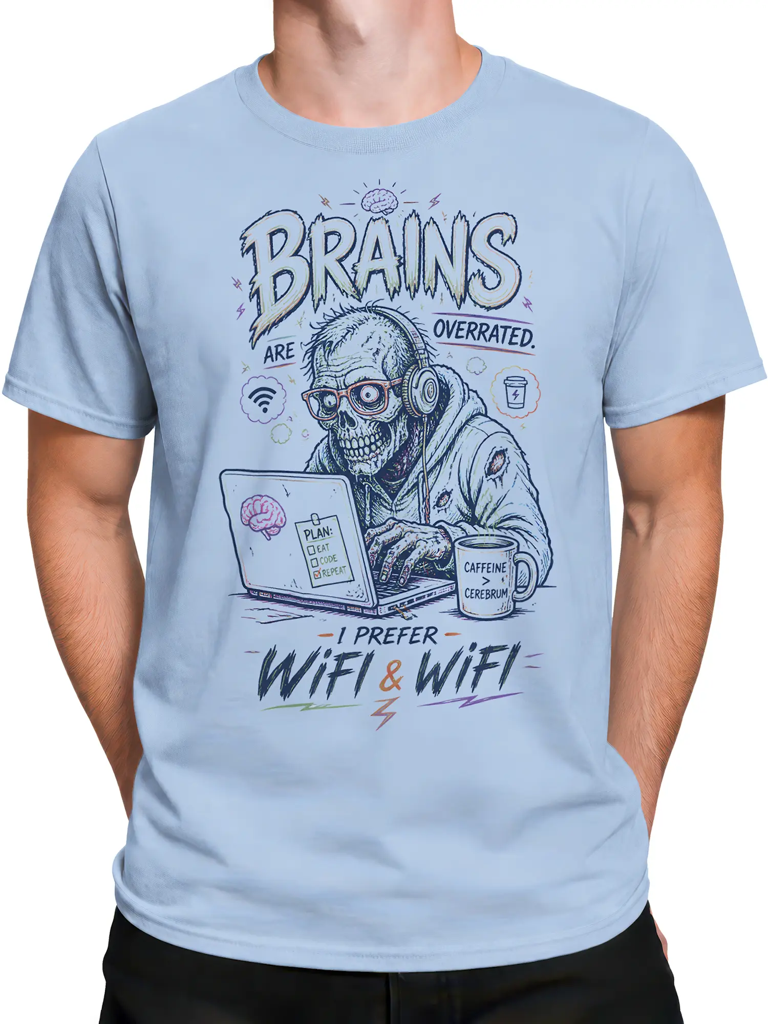 Male torso wearing a light blue zombie T-shirt with skull, headphones, laptop, coffee, and Wi-Fi artwork