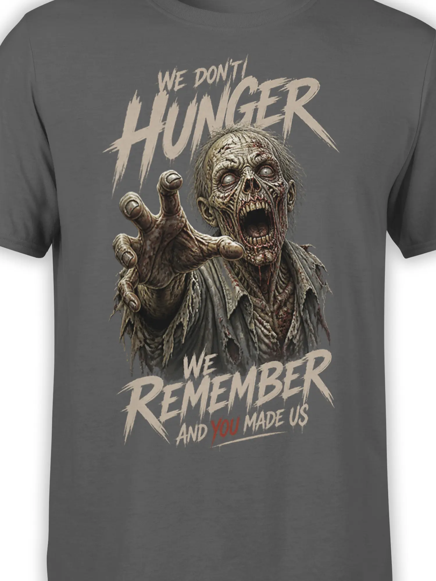 Close-up of gray zombie shirt artwork showing a decayed face, reaching hand, and distressed horror text