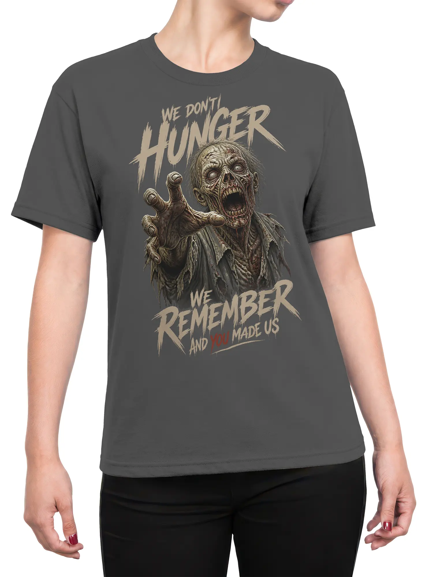 Female torso wearing a gray zombie T-shirt with a reaching undead figure and bold distressed lettering