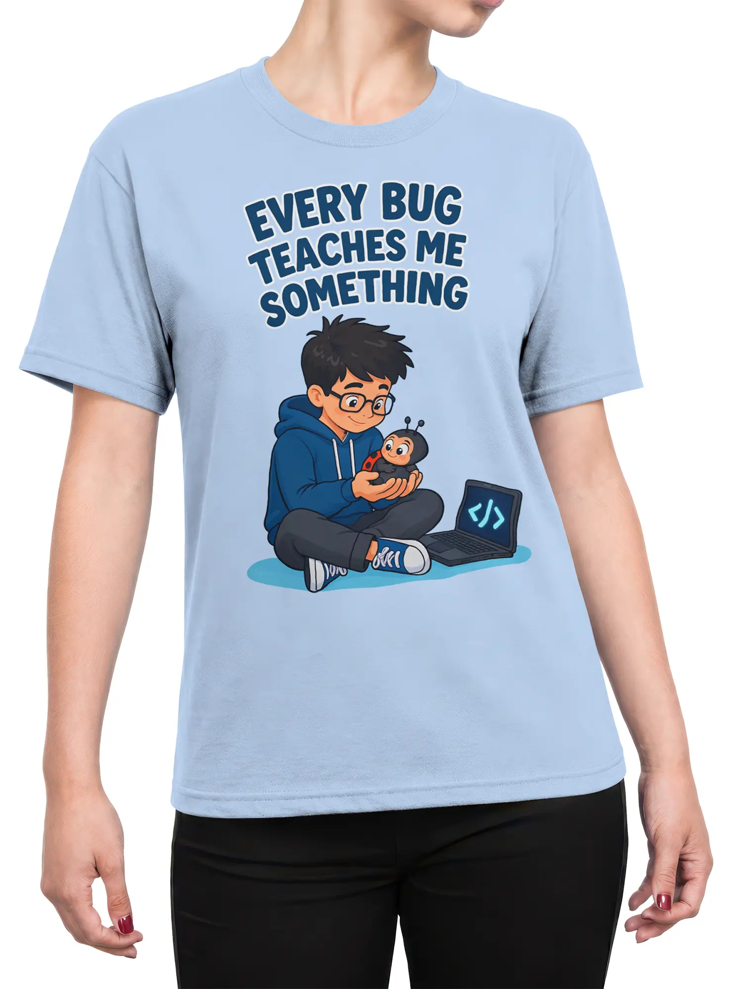 Female torso wearing a light blue programmer T-shirt with a coder, ladybug, laptop, and learning slogan