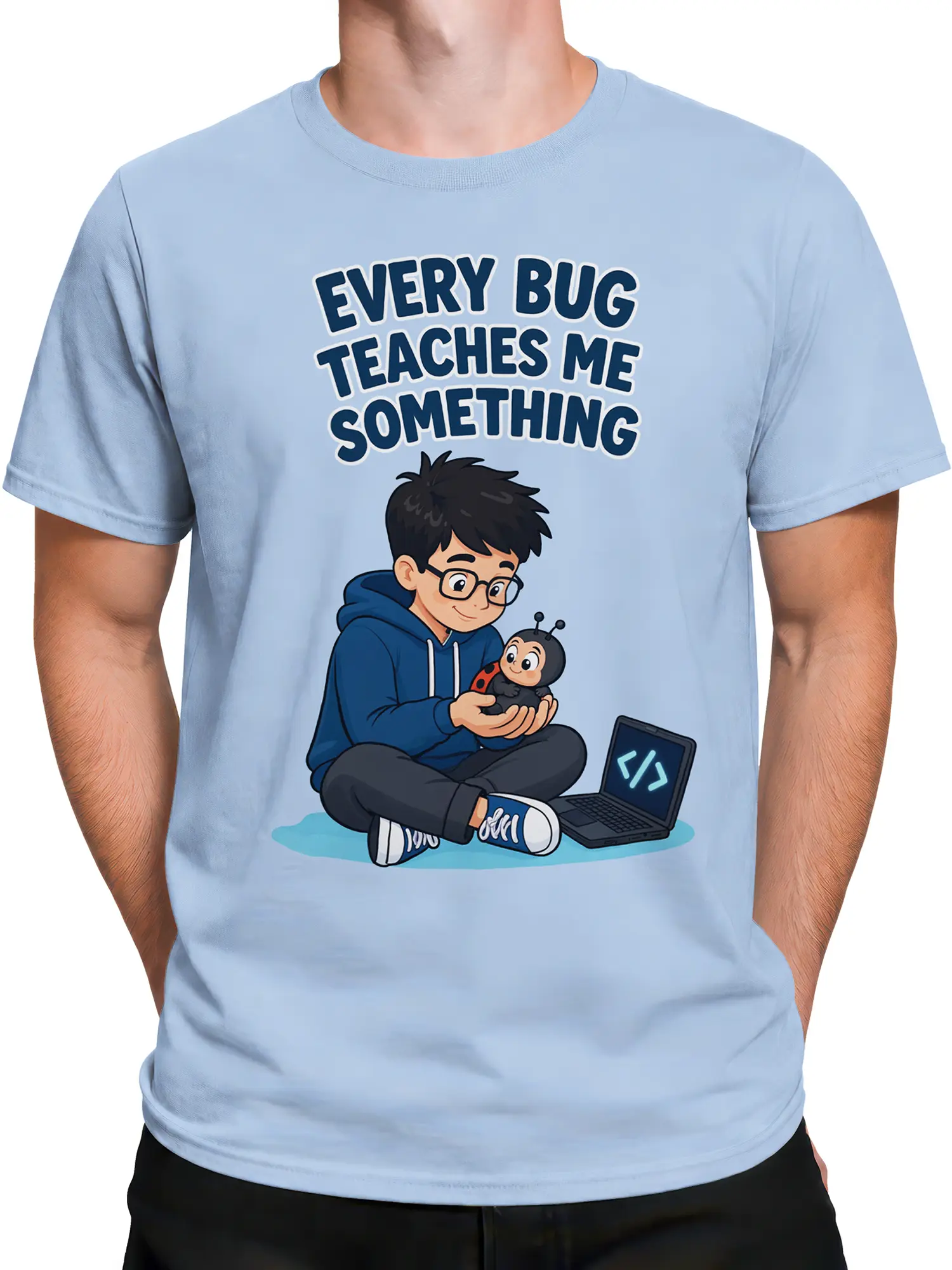 Male torso wearing a light blue programmer T-shirt with a young coder, ladybug, laptop, and bold slogan