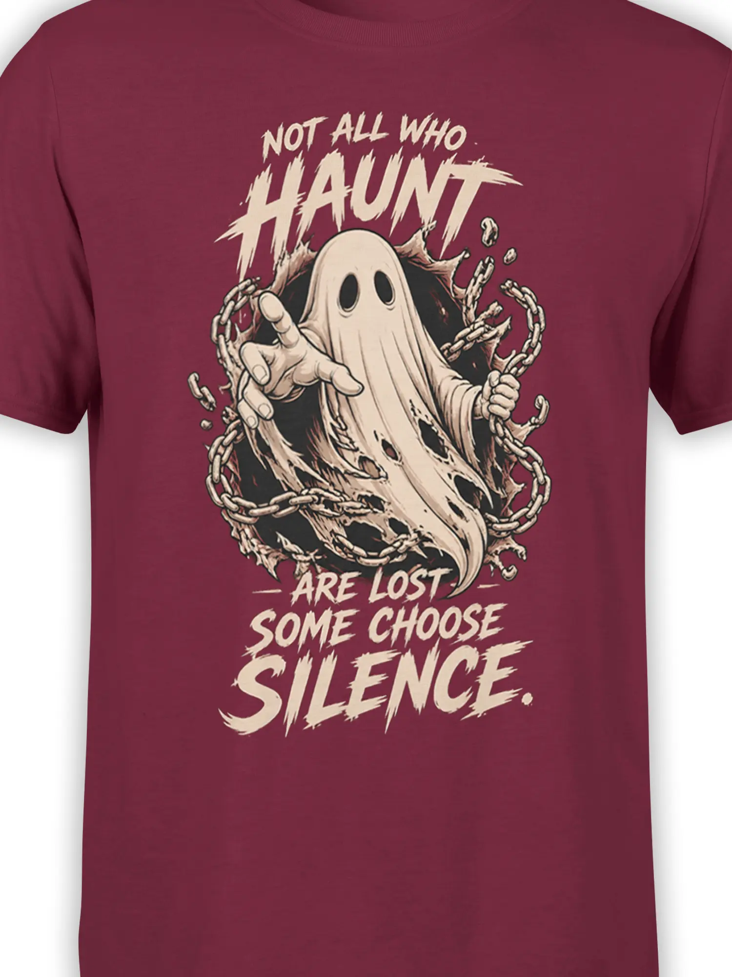 Close-up of the chained ghost artwork and cream silence quote on a maroon T-shirt