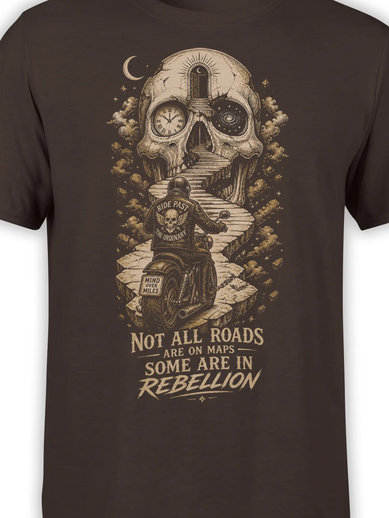 Close-up of brown biker shirt design showing the rider, skull gateway, clock, galaxy, and rebellion lettering