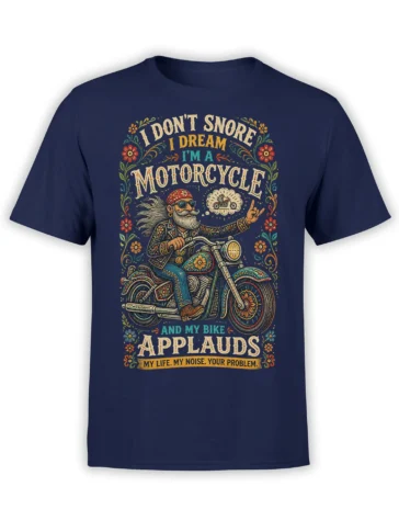 Vintage bearded biker riding a decorated motorcycle with floral details and bold lettering on a navy T-shirt