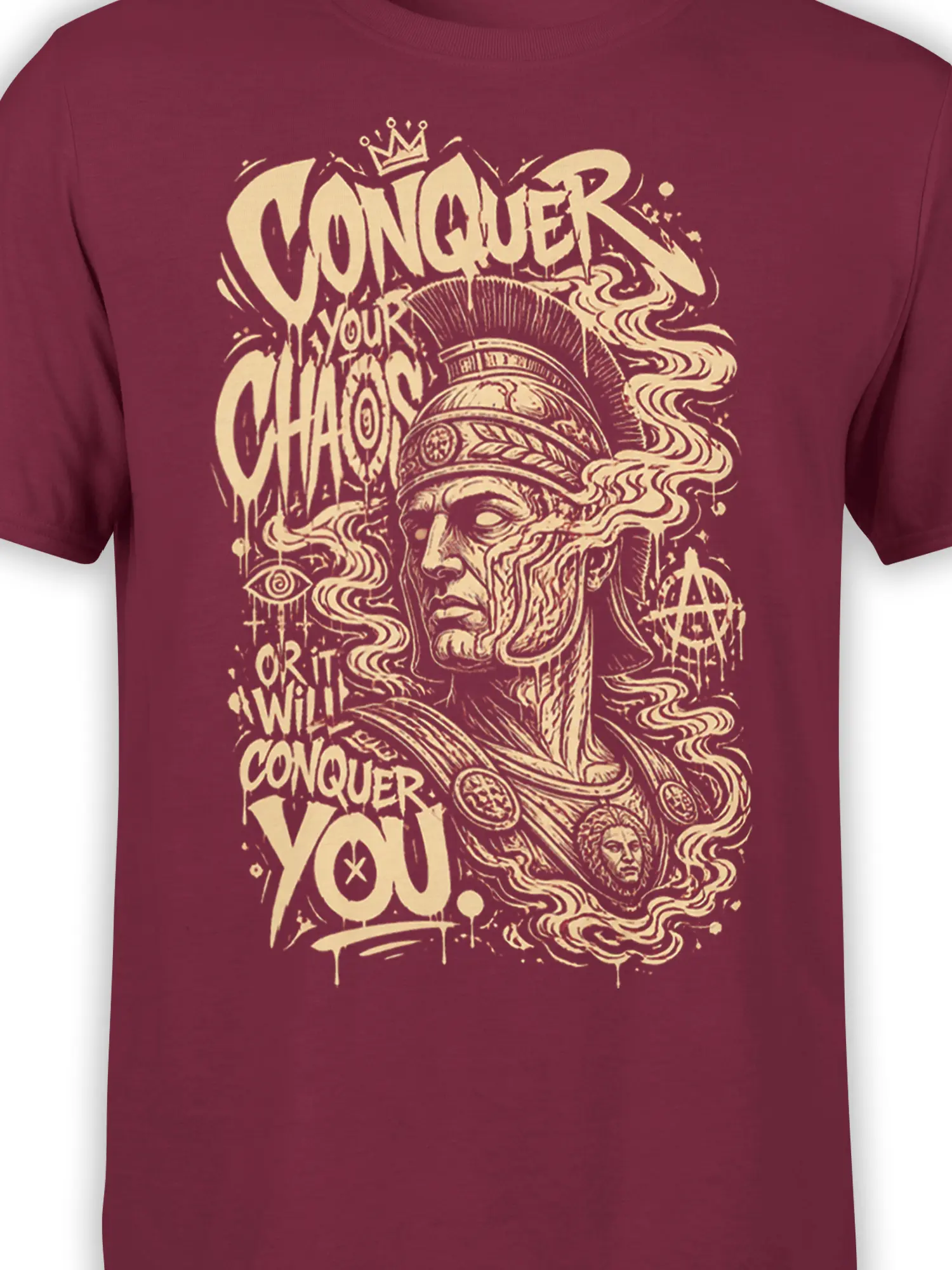 Close-up of the cream helmeted warrior artwork and Conquer Your Chaos lettering on a burgundy T-shirt