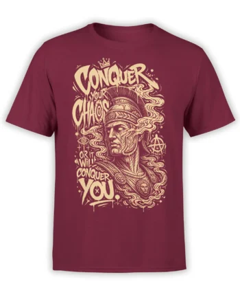 Burgundy warrior T-shirt with cream vintage artwork, flowing hair, symbols, and bold Conquer Your Chaos lettering