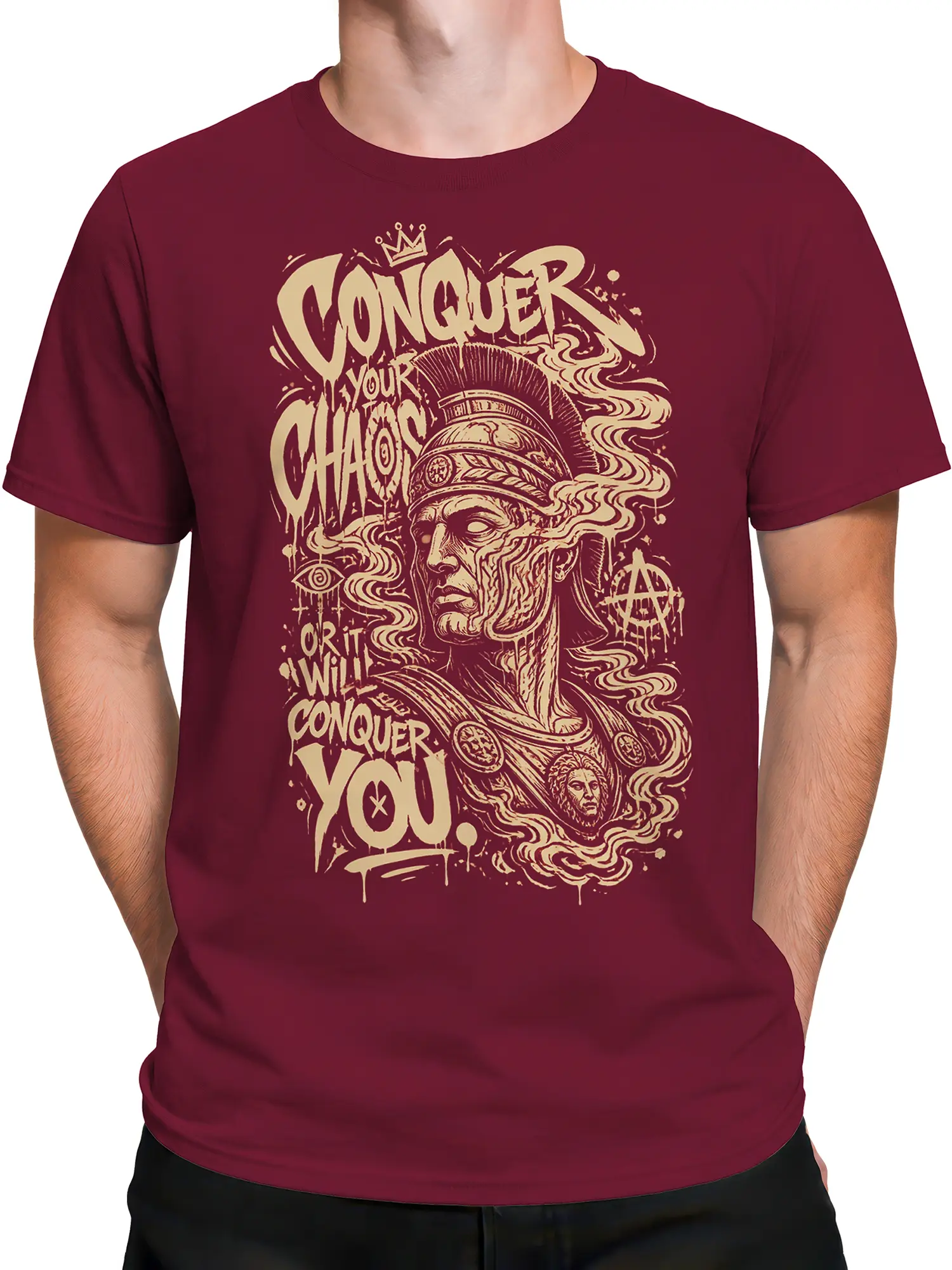 Male torso wearing a burgundy warrior T-shirt with cream vintage artwork and Conquer Your Chaos lettering