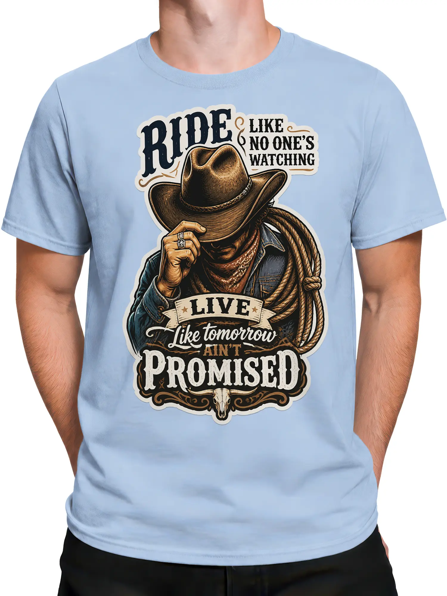 Male torso wearing a light blue cowboy T-shirt with shadowed rider and western quote design