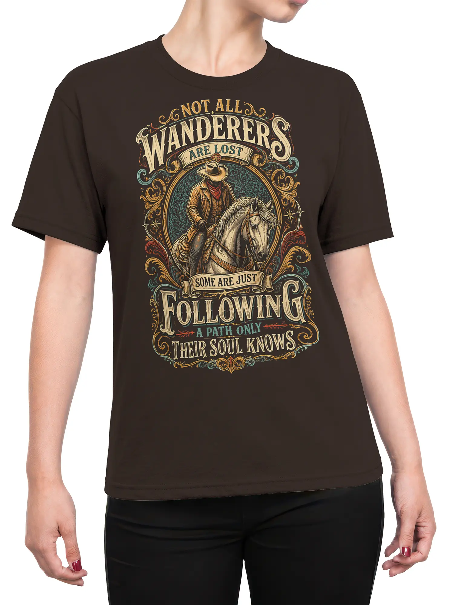 Female torso wearing brown cowboy wanderer T-shirt with horse artwork and ornate soulful lettering