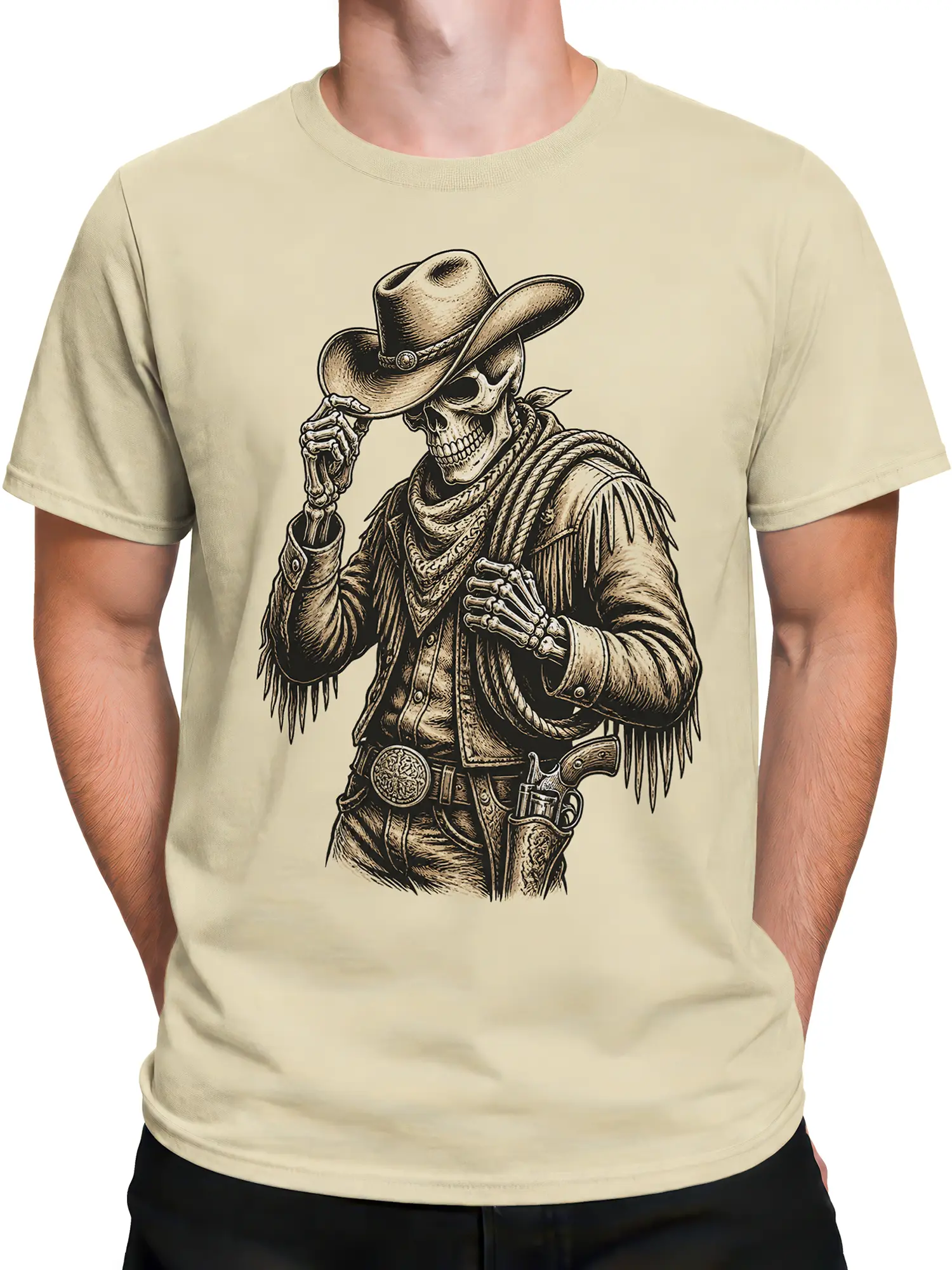 Male torso wearing a beige western T-shirt with a skeleton cowboy, hat, fringe, belt buckle, and knife