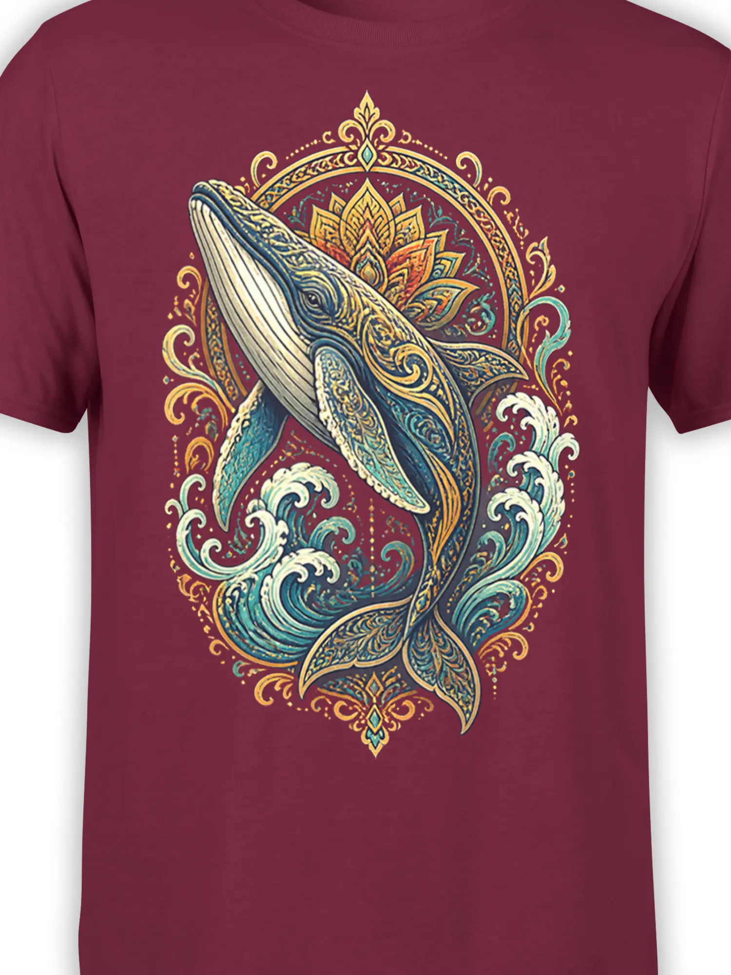 Close-up of the detailed whale, waves, and lotus-like mandala artwork on a maroon shirt