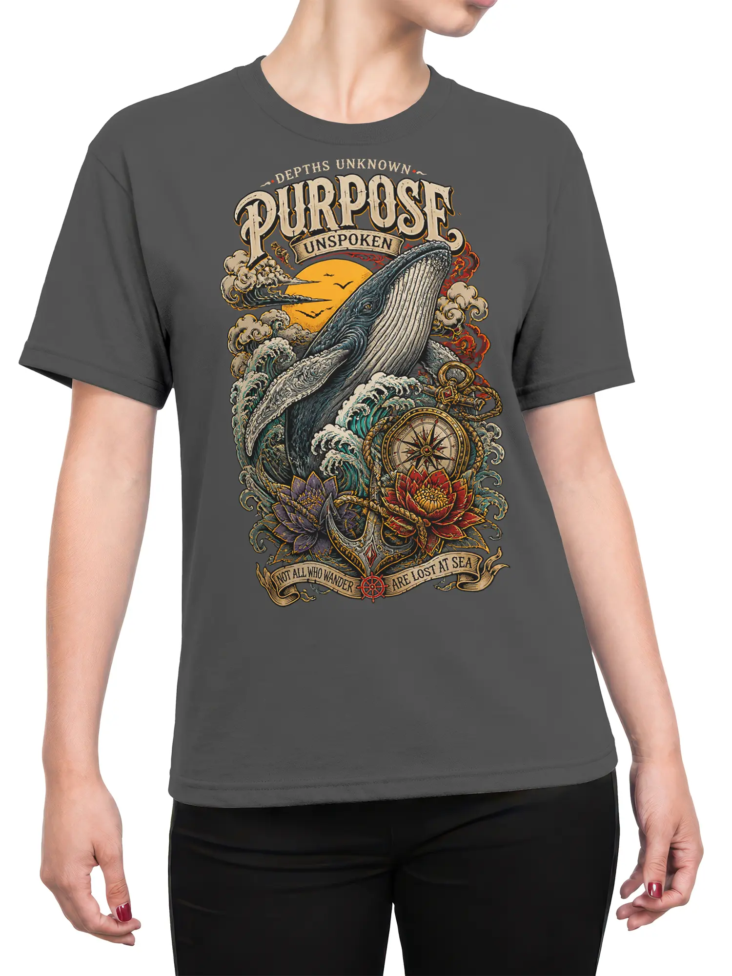 Female torso wearing a dark gray whale compass T-shirt with vintage ocean artwork and a golden moon