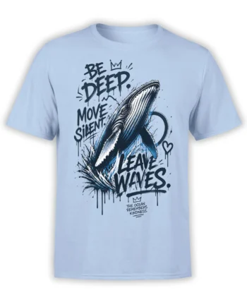 Light blue whale T-shirt with bold “Be Deep Move Silent Leave Waves” text and crashing ocean artwork
