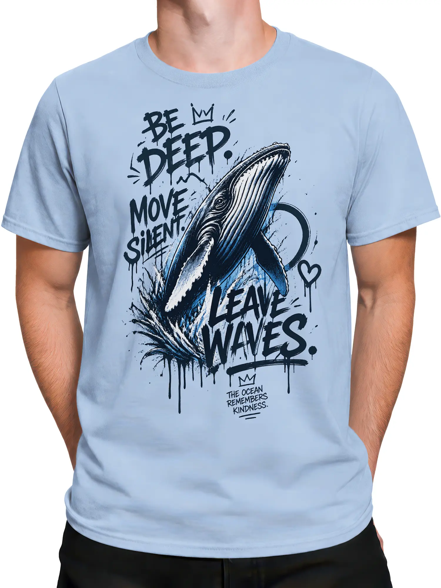 Male torso wearing a light blue whale T-shirt with deep ocean artwork and bold wave lettering