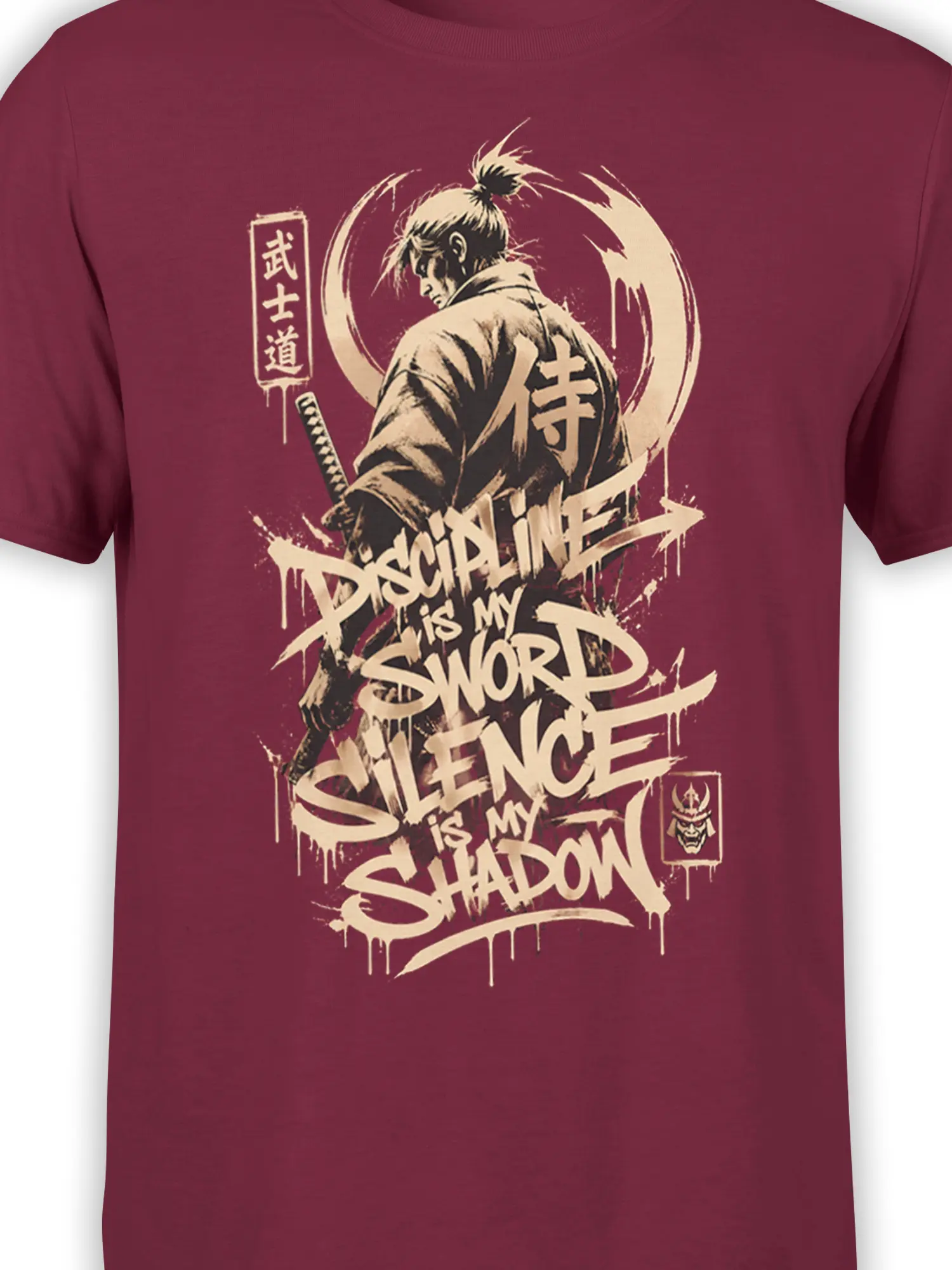 Close-up of samurai warrior artwork and cream discipline and silence lettering on burgundy fabric