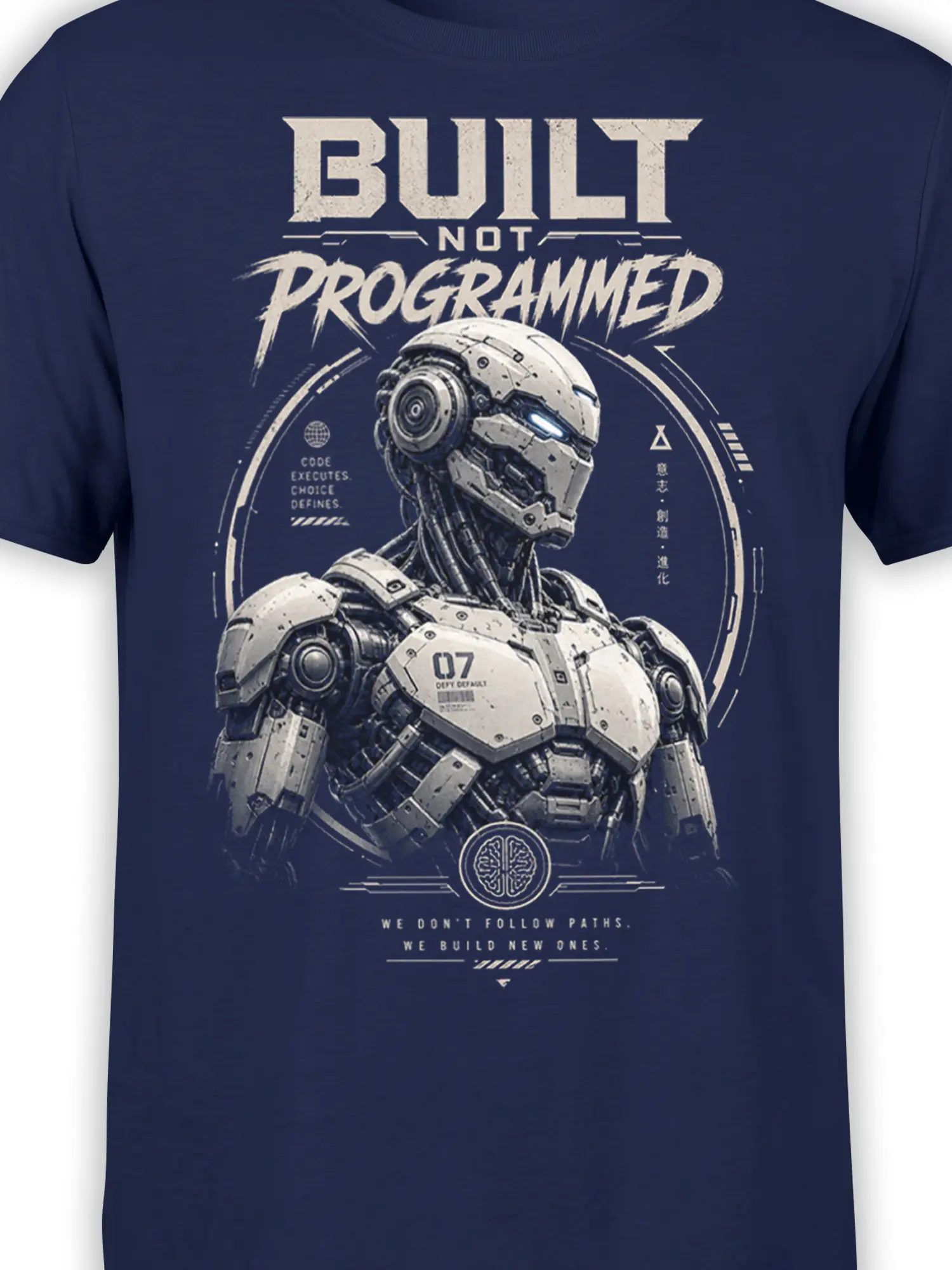 Close-up of the detailed futuristic robot and “Built Not Programmed” artwork on a navy shirt