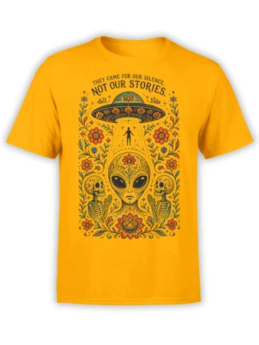 Yellow alien T-shirt with a floral UFO, skeletons, flowers, and the quote They Came for Our Silence, Not Our Stories